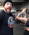 Rhea_Ripley_flexes_on_Sheamus_with_her__Nightmare__Arms_workout_2679.jpg