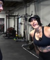 Rhea_Ripley_flexes_on_Sheamus_with_her__Nightmare__Arms_workout_2760.jpg