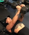 Rhea_Ripley_flexes_on_Sheamus_with_her__Nightmare__Arms_workout_2972.jpg