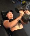 Rhea_Ripley_flexes_on_Sheamus_with_her__Nightmare__Arms_workout_2978.jpg