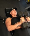 Rhea_Ripley_flexes_on_Sheamus_with_her__Nightmare__Arms_workout_2979.jpg