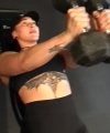 Rhea_Ripley_flexes_on_Sheamus_with_her__Nightmare__Arms_workout_2982.jpg