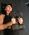 Rhea_Ripley_flexes_on_Sheamus_with_her__Nightmare__Arms_workout_2984.jpg