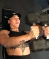 Rhea_Ripley_flexes_on_Sheamus_with_her__Nightmare__Arms_workout_2986.jpg
