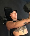 Rhea_Ripley_flexes_on_Sheamus_with_her__Nightmare__Arms_workout_2992.jpg