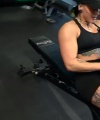 Rhea_Ripley_flexes_on_Sheamus_with_her__Nightmare__Arms_workout_3001.jpg