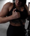 Rhea_Ripley_flexes_on_Sheamus_with_her__Nightmare__Arms_workout_3084.jpg