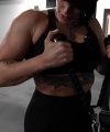 Rhea_Ripley_flexes_on_Sheamus_with_her__Nightmare__Arms_workout_3085.jpg