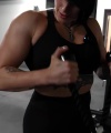 Rhea_Ripley_flexes_on_Sheamus_with_her__Nightmare__Arms_workout_3086.jpg
