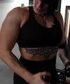 Rhea_Ripley_flexes_on_Sheamus_with_her__Nightmare__Arms_workout_3087.jpg