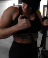 Rhea_Ripley_flexes_on_Sheamus_with_her__Nightmare__Arms_workout_3091.jpg