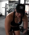 Rhea_Ripley_flexes_on_Sheamus_with_her__Nightmare__Arms_workout_3098.jpg