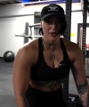 Rhea_Ripley_flexes_on_Sheamus_with_her__Nightmare__Arms_workout_3099.jpg