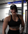 Rhea_Ripley_flexes_on_Sheamus_with_her__Nightmare__Arms_workout_3100.jpg