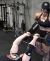 Rhea_Ripley_flexes_on_Sheamus_with_her__Nightmare__Arms_workout_3150.jpg