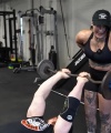 Rhea_Ripley_flexes_on_Sheamus_with_her__Nightmare__Arms_workout_3151.jpg