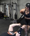Rhea_Ripley_flexes_on_Sheamus_with_her__Nightmare__Arms_workout_3152.jpg