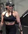 Rhea_Ripley_flexes_on_Sheamus_with_her__Nightmare__Arms_workout_3205.jpg