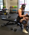 Rhea_Ripley_flexes_on_Sheamus_with_her__Nightmare__Arms_workout_3253.jpg