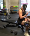 Rhea_Ripley_flexes_on_Sheamus_with_her__Nightmare__Arms_workout_3254.jpg