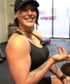 Rhea_Ripley_flexes_on_Sheamus_with_her__Nightmare__Arms_workout_3261.jpg