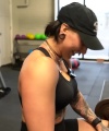 Rhea_Ripley_flexes_on_Sheamus_with_her__Nightmare__Arms_workout_3263.jpg