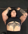 Rhea_Ripley_flexes_on_Sheamus_with_her__Nightmare__Arms_workout_3283.jpg