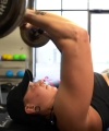 Rhea_Ripley_flexes_on_Sheamus_with_her__Nightmare__Arms_workout_3302.jpg