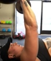 Rhea_Ripley_flexes_on_Sheamus_with_her__Nightmare__Arms_workout_3303.jpg