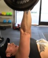 Rhea_Ripley_flexes_on_Sheamus_with_her__Nightmare__Arms_workout_3304.jpg