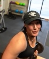 Rhea_Ripley_flexes_on_Sheamus_with_her__Nightmare__Arms_workout_3311.jpg