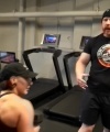 Rhea_Ripley_flexes_on_Sheamus_with_her__Nightmare__Arms_workout_3361.jpg