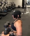 Rhea_Ripley_flexes_on_Sheamus_with_her__Nightmare__Arms_workout_3371.jpg