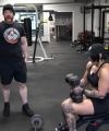 Rhea_Ripley_flexes_on_Sheamus_with_her__Nightmare__Arms_workout_3399.jpg