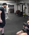 Rhea_Ripley_flexes_on_Sheamus_with_her__Nightmare__Arms_workout_3408.jpg