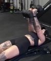 Rhea_Ripley_flexes_on_Sheamus_with_her__Nightmare__Arms_workout_3411.jpg