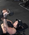 Rhea_Ripley_flexes_on_Sheamus_with_her__Nightmare__Arms_workout_3419.jpg