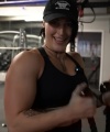 Rhea_Ripley_flexes_on_Sheamus_with_her__Nightmare__Arms_workout_3472.jpg