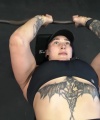 Rhea_Ripley_flexes_on_Sheamus_with_her__Nightmare__Arms_workout_3554.jpg