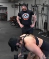 Rhea_Ripley_flexes_on_Sheamus_with_her__Nightmare__Arms_workout_3573.jpg