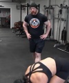 Rhea_Ripley_flexes_on_Sheamus_with_her__Nightmare__Arms_workout_3574.jpg