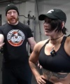 Rhea_Ripley_flexes_on_Sheamus_with_her__Nightmare__Arms_workout_3586.jpg