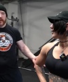 Rhea_Ripley_flexes_on_Sheamus_with_her__Nightmare__Arms_workout_3588.jpg