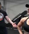 Rhea_Ripley_flexes_on_Sheamus_with_her__Nightmare__Arms_workout_3589.jpg