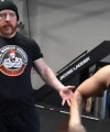 Rhea_Ripley_flexes_on_Sheamus_with_her__Nightmare__Arms_workout_3591.jpg