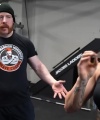 Rhea_Ripley_flexes_on_Sheamus_with_her__Nightmare__Arms_workout_3592.jpg
