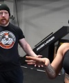 Rhea_Ripley_flexes_on_Sheamus_with_her__Nightmare__Arms_workout_3594.jpg