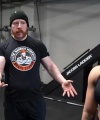 Rhea_Ripley_flexes_on_Sheamus_with_her__Nightmare__Arms_workout_3597.jpg