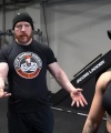 Rhea_Ripley_flexes_on_Sheamus_with_her__Nightmare__Arms_workout_3598.jpg