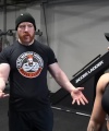 Rhea_Ripley_flexes_on_Sheamus_with_her__Nightmare__Arms_workout_3599.jpg